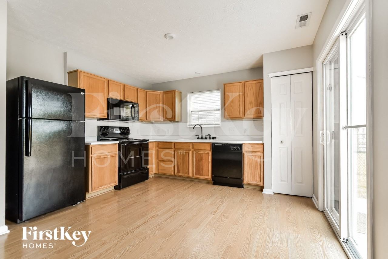 7741 Thorney Wood Dr - Photo 6 of 15