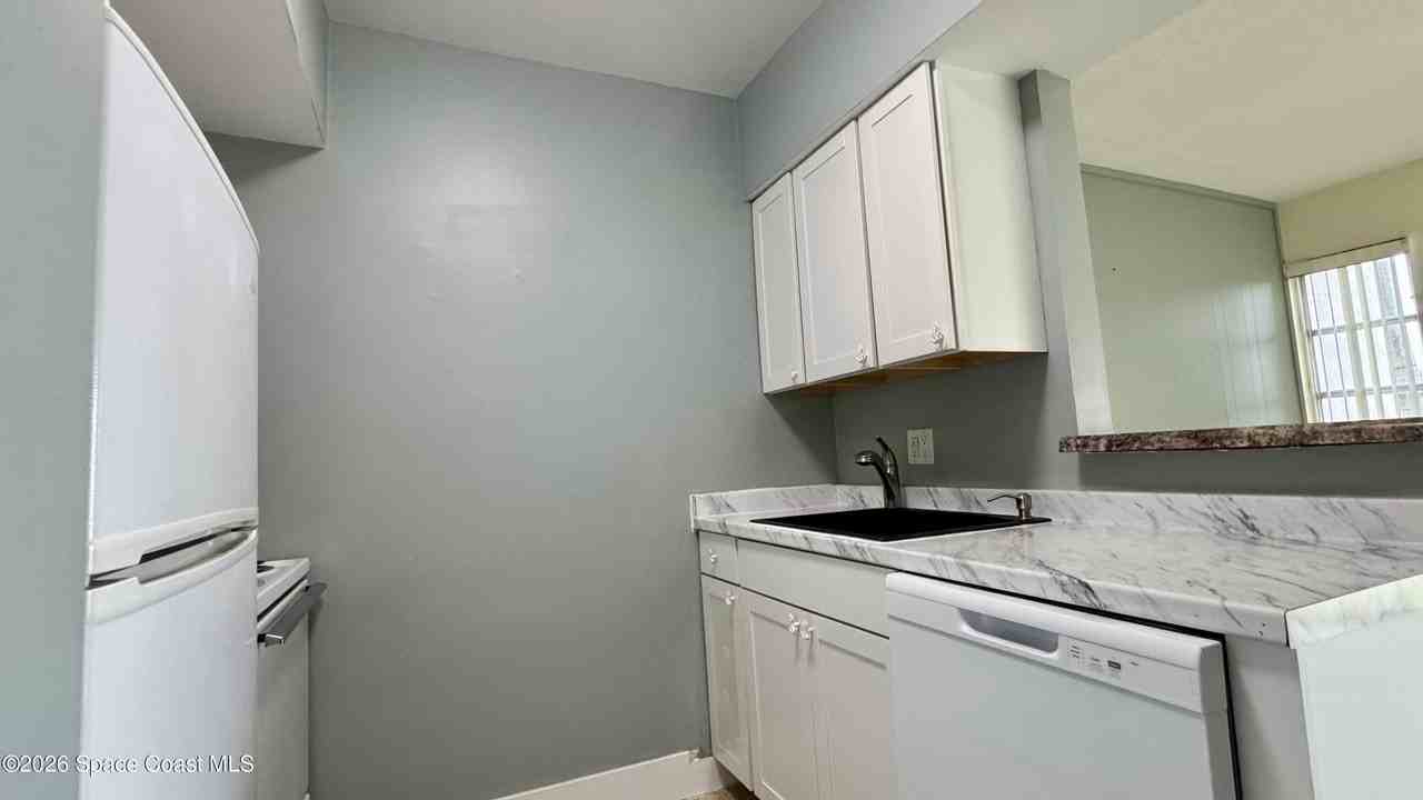 250 N Banana River Dr Apt F15 #F15 - Photo 7 of 13