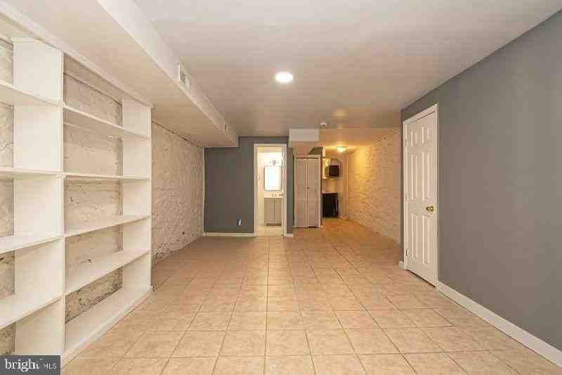 307 E 25TH Street unit: Basement Apartment - Photo 7 of 21