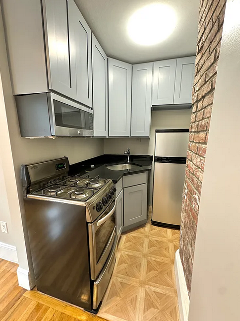 2042 E 57th St - Photo 2 of 4