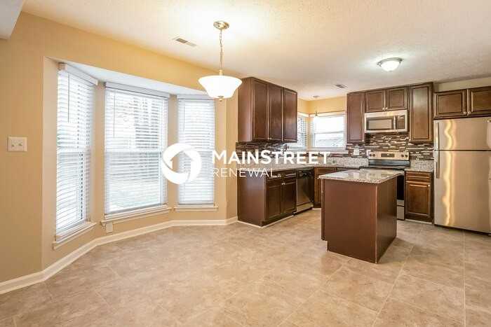 3233 Forest Breeze Dr - Photo 4 of 15