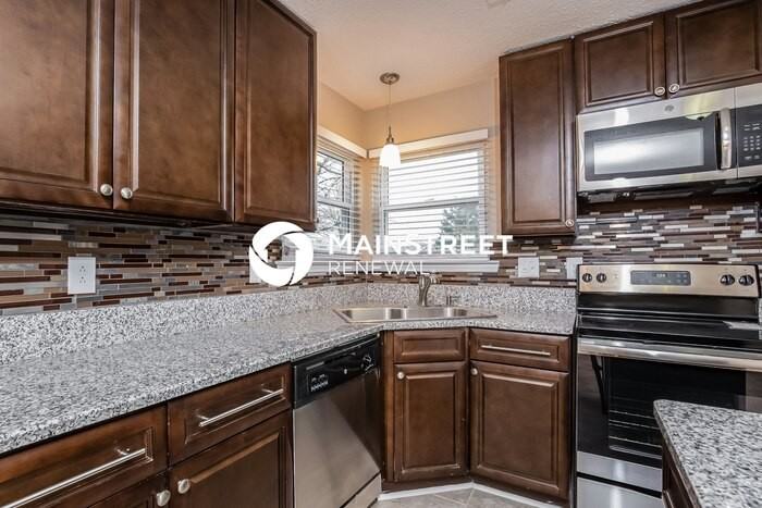 3233 Forest Breeze Dr - Photo 6 of 15