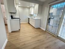 11702 Lakewood Blvd. Downey, 2 Car Garage, Central Air/Heat and in Unit Laundry! - Photo 1 of 1