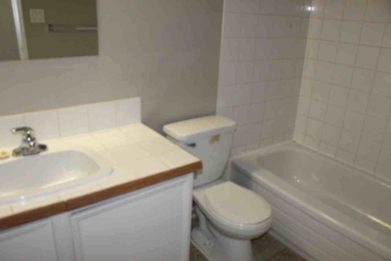 Booth Apartments - Photo 7 of 12