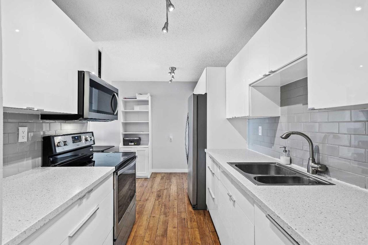 1335 12 Ave Sw - Photo 2 of 17