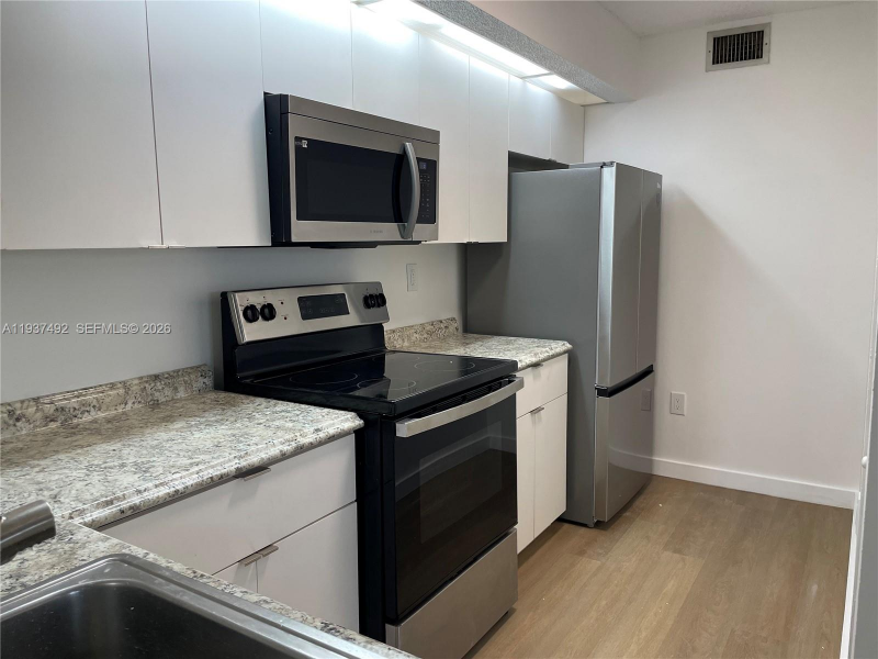 8650 Sw 212th St #102 - Photo 3 of 20