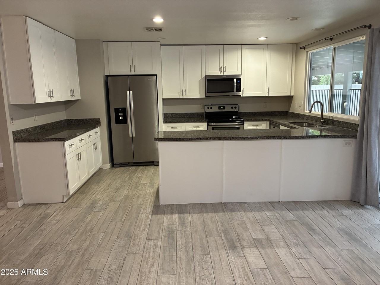 6713 W Carol Ave - Photo 6 of 33