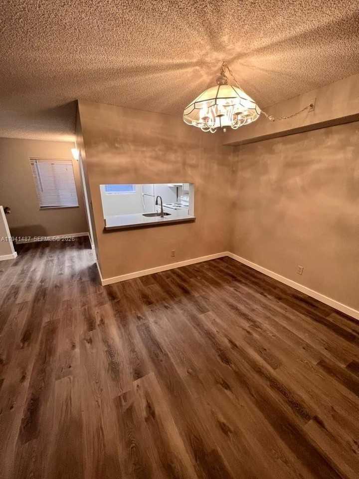 403 Gardens Dr #201 - Photo 2 of 20