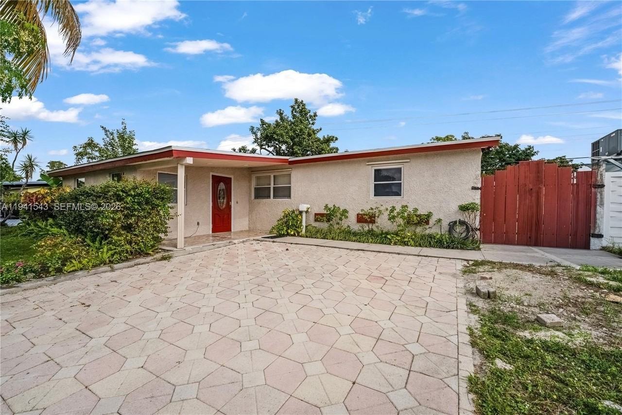 801 N 70th Ave - Photo 2 of 49