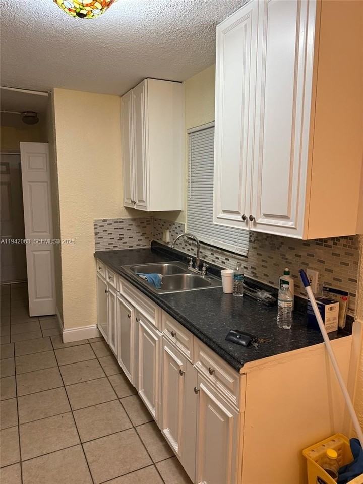 304 Nw 6th Ave - Photo 7 of 11