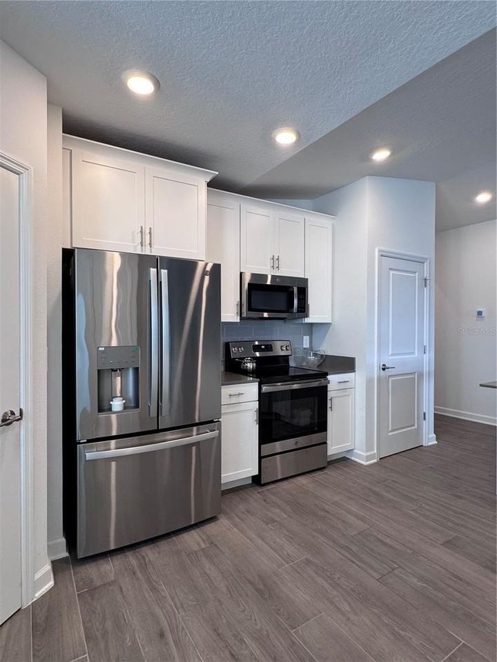 5653 Wood Bridge Pl - Photo 7 of 31