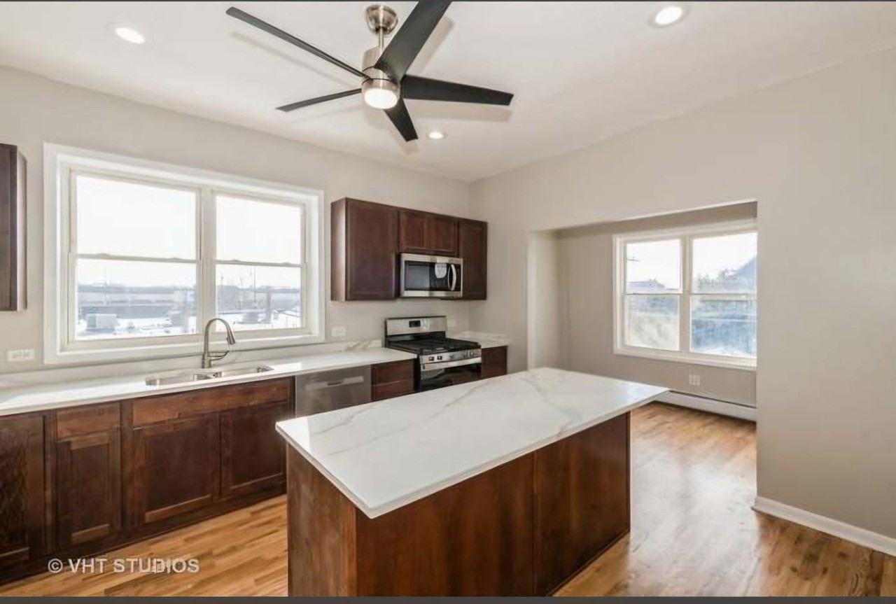 1133 Beloit Ave Apt 2 #2 - Photo 4 of 7