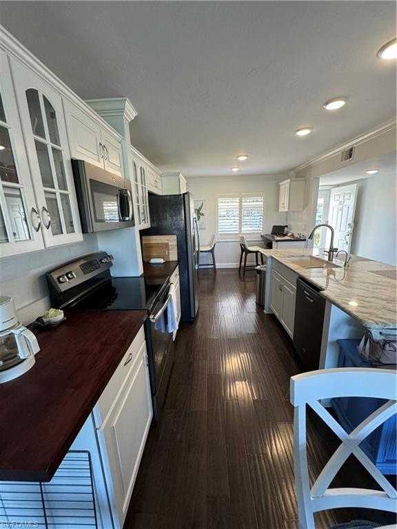 5975 Bloomfield Cir Apt C107 #C107 - Photo 4 of 33