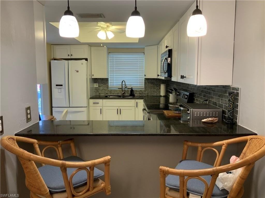 5530 Rattlesnake Hammock Rd Apt K103 #K103 - Photo 6 of 32