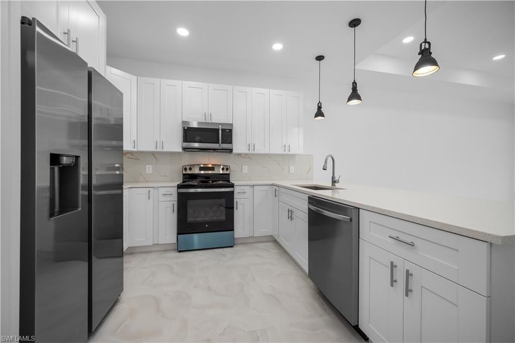 2400 Wanda Ave N - Photo 4 of 13