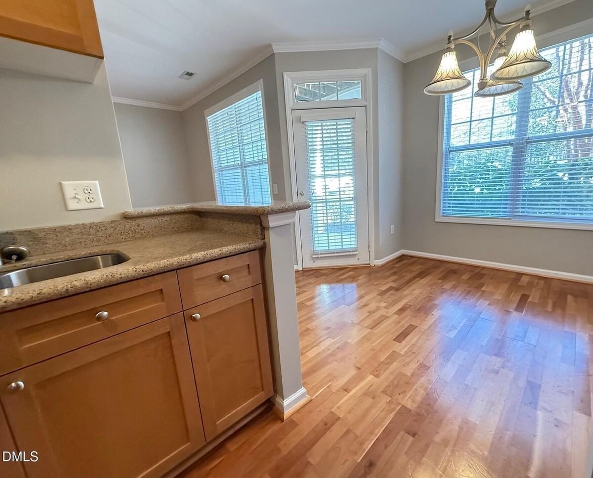 8021 Allyns Landing Way Apt 104 #104 - Photo 7 of 24