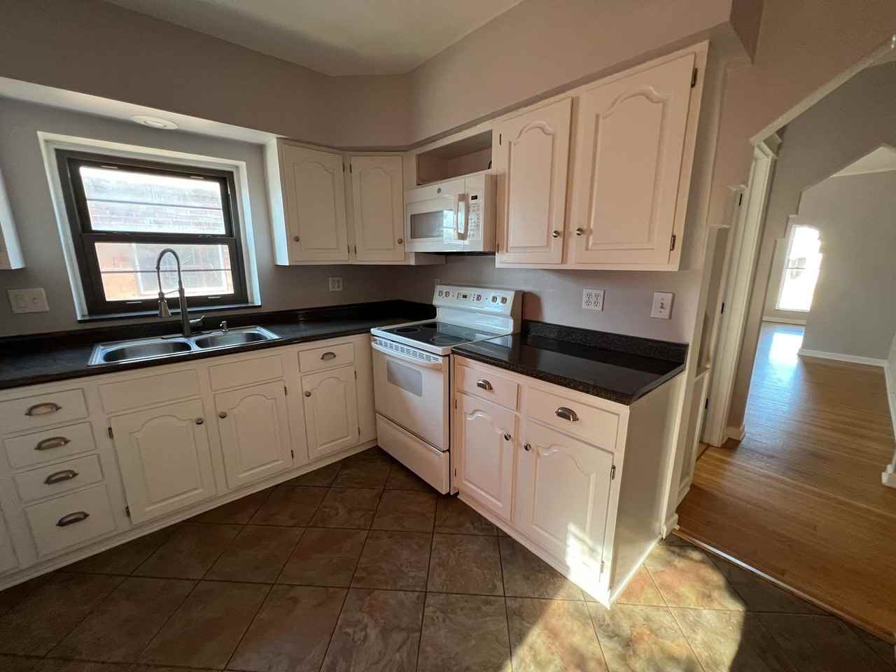 5748 Tholozan Ave - Photo 2 of 12