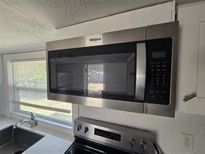 736 NW 3d Avenue - Photo 2 of 3