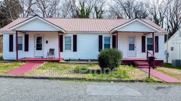 featured image of 306 E 1st St