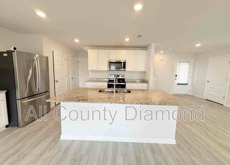 6599 Atkins Rd - Photo 5 of 46