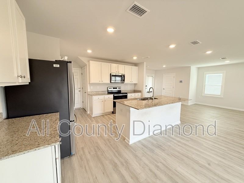 6599 Atkins Rd - Photo 6 of 46