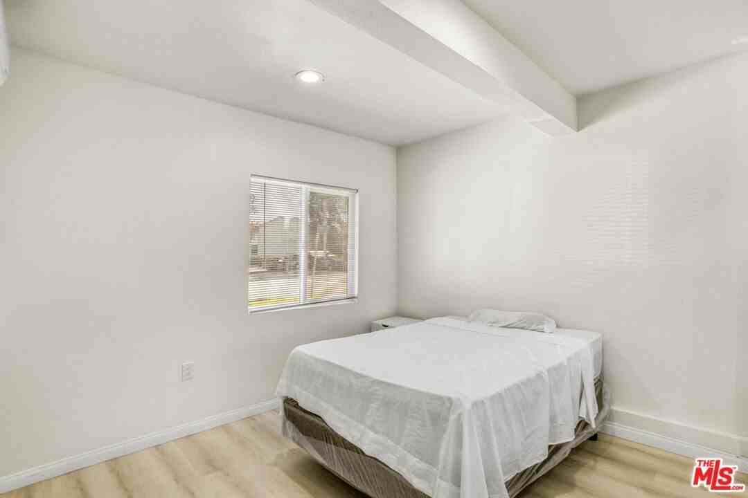 7703 Baird Ave - Photo 5 of 11