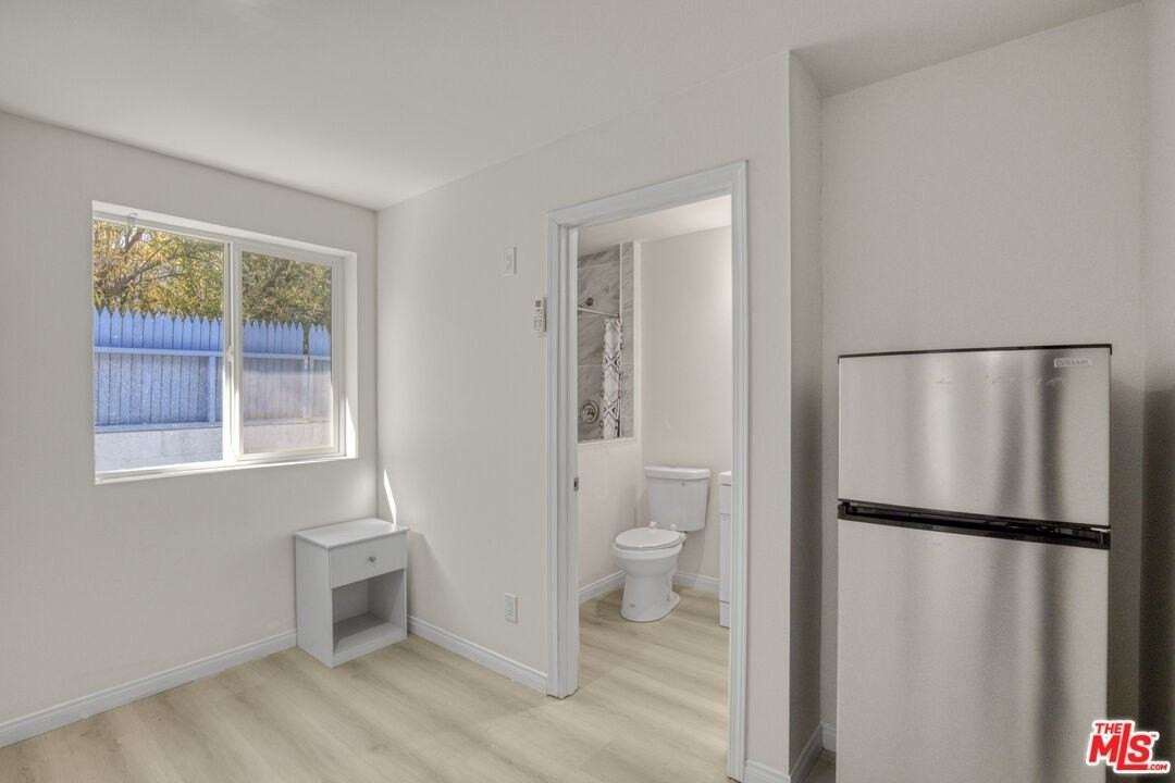 7705 Baird Ave - Photo 3 of 14