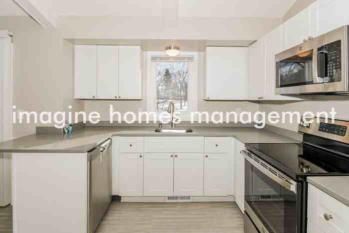 8008 Brunswick Ave N - Photo 6 of 17