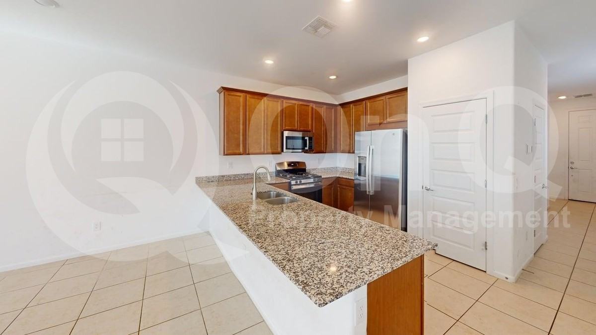 10457 W Vandever Dr - Photo 6 of 22