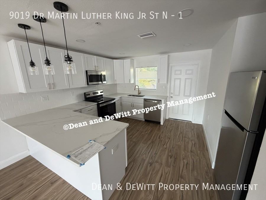 9019 Dr Martin Luther King Jr St N #1 - Photo 5 of 18