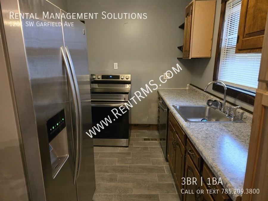 1201 Sw Garfield Ave - Photo 2 of 5