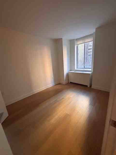 418 E 54th St #210 - Photo 2 of 11