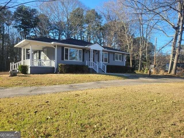 5012 Suwanee Dam Rd - Photo 2 of 13