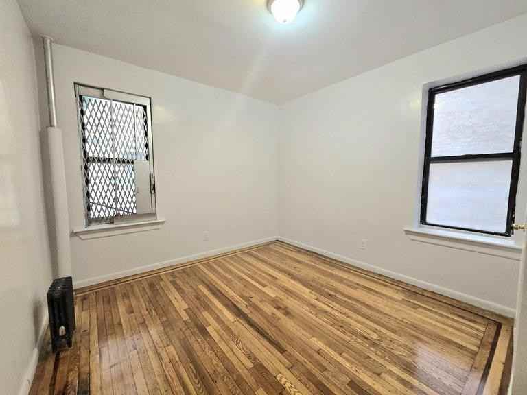 1115 Jerome Ave - Photo 4 of 5