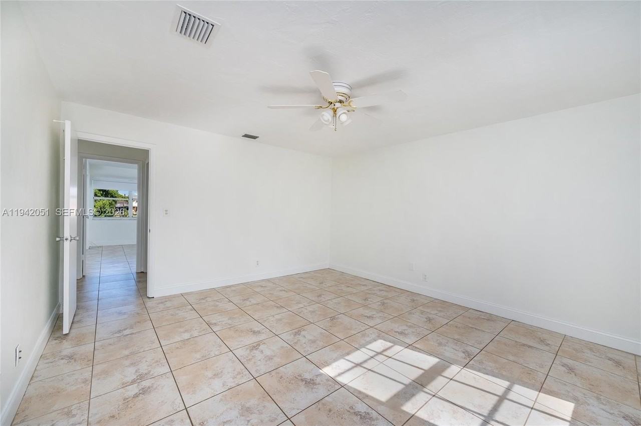 1345 W 71st St - Photo 2 of 26