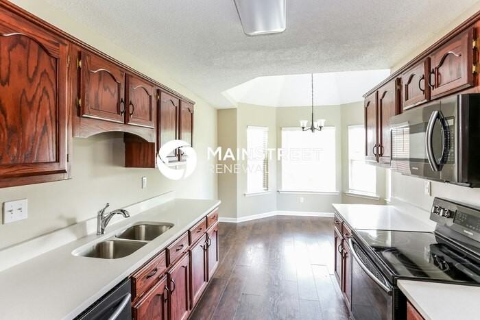 7644 Tally Ho Dr E - Photo 7 of 16