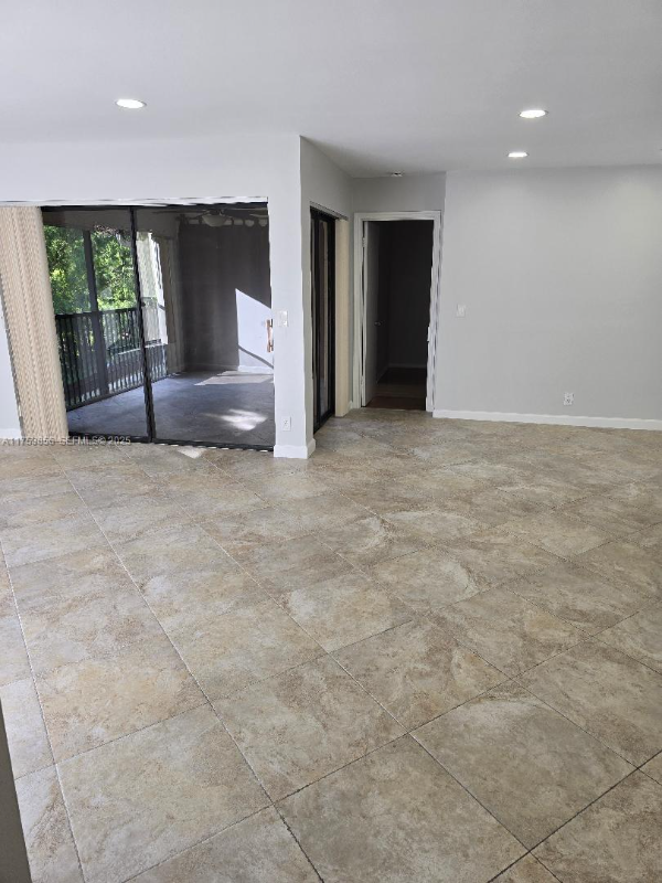 3299 Cocoplum Cir - Photo 3 of 7