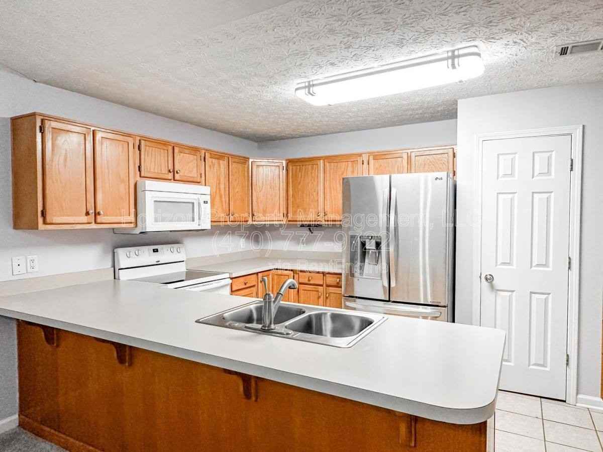 3955 Hidden Hollow Dr - Photo 3 of 10