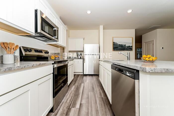 7625 Saffron Ave - Photo 7 of 26