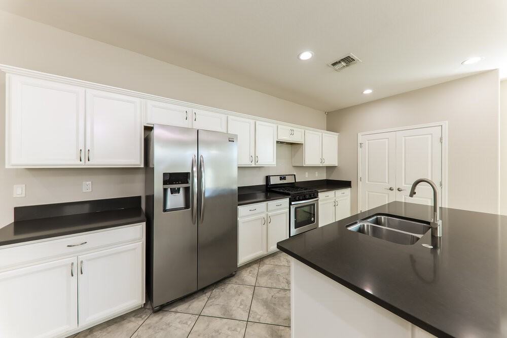 1287 N 166th Ave - Photo 7 of 16