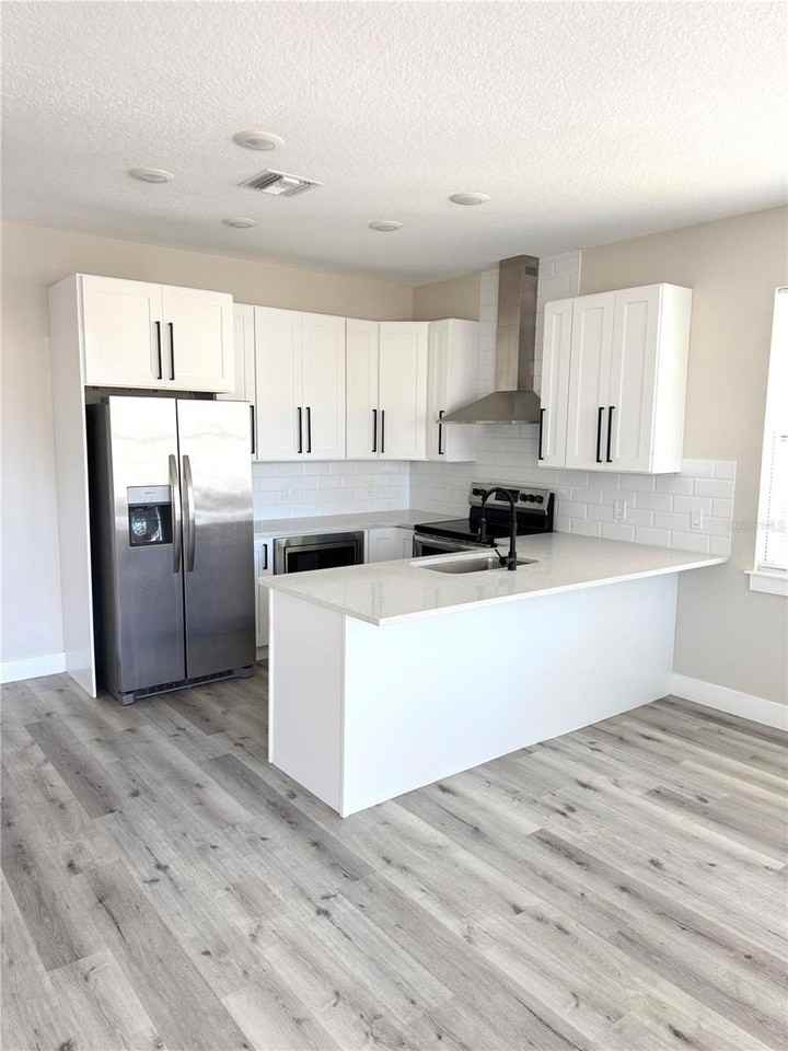 6900 Dartmouth Ave N - Photo 4 of 14