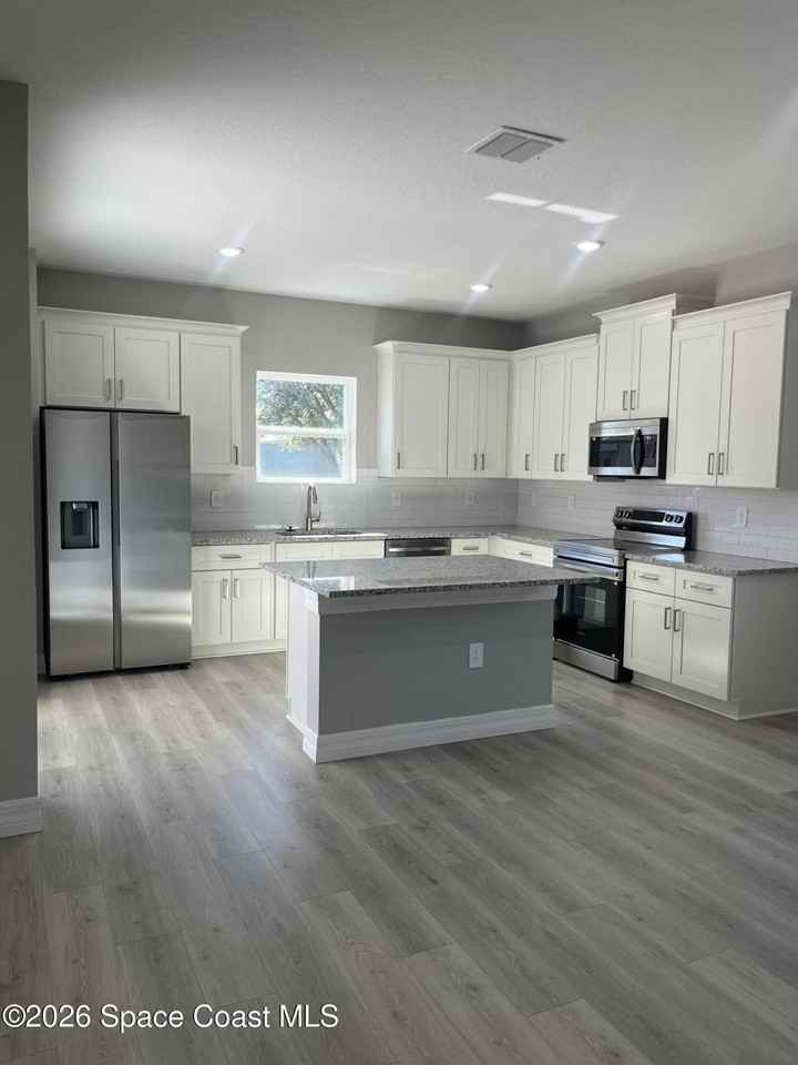 1106 Homer St Nw - Photo 4 of 24