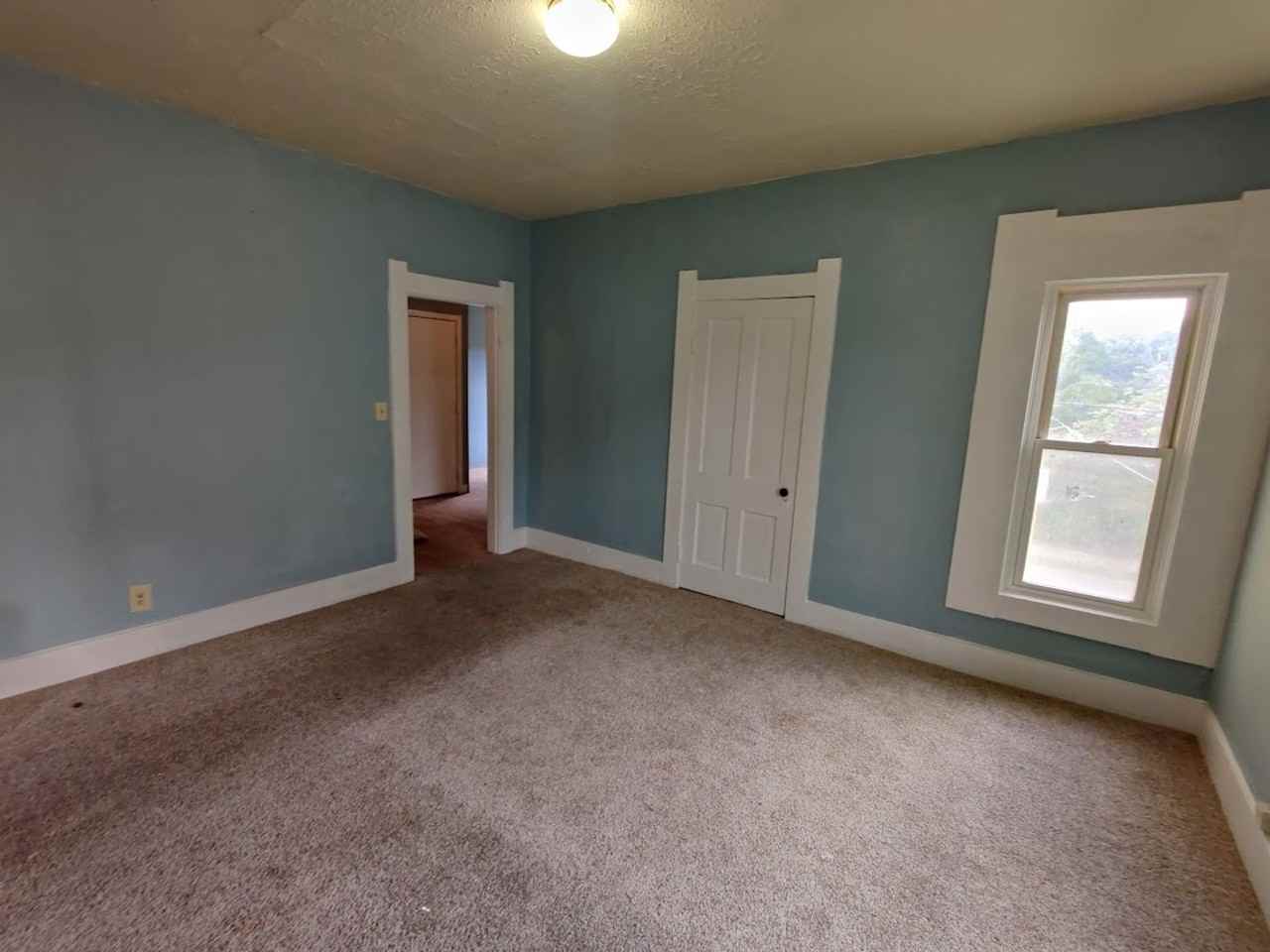 116 116 -3 N Tompkins - Photo 3 of 16