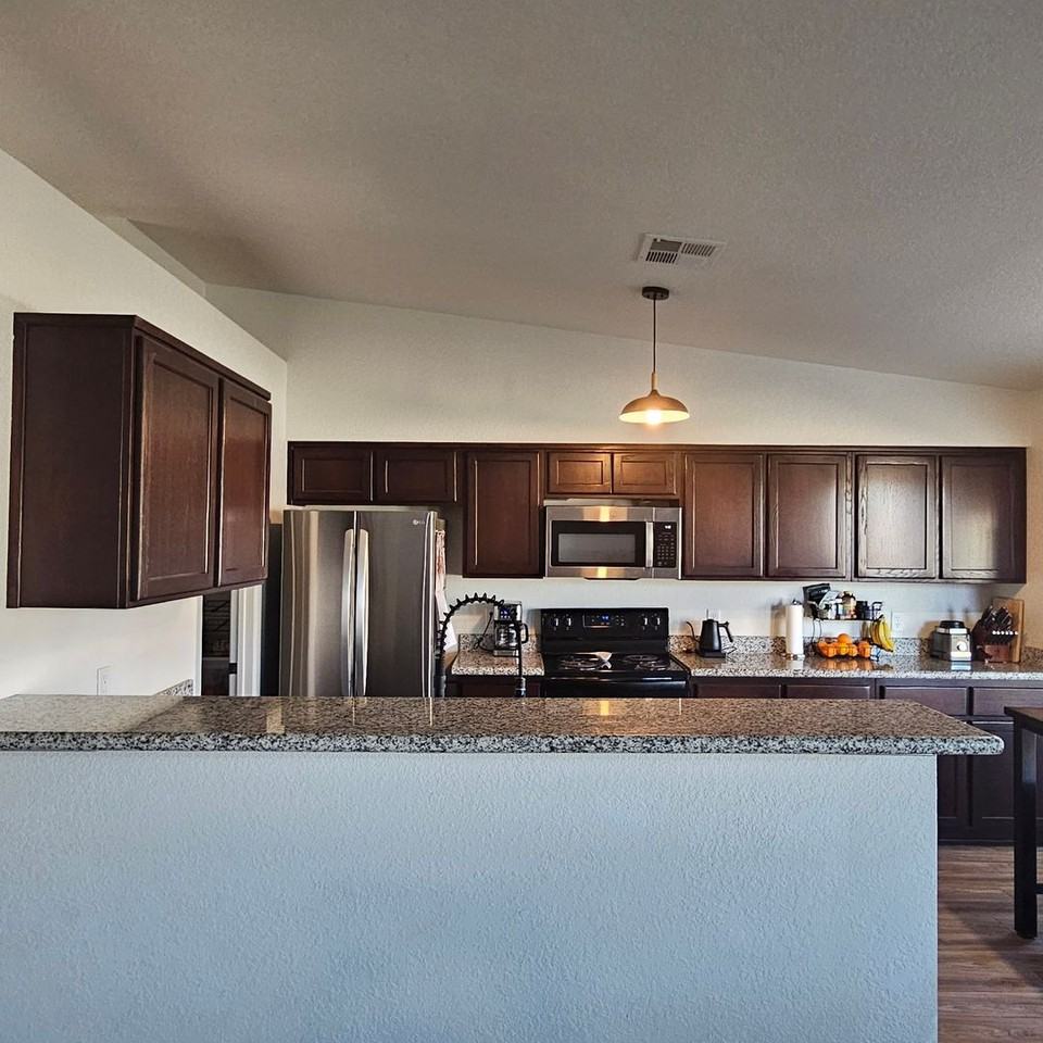 7718 E 43rd Ln - Photo 6 of 27