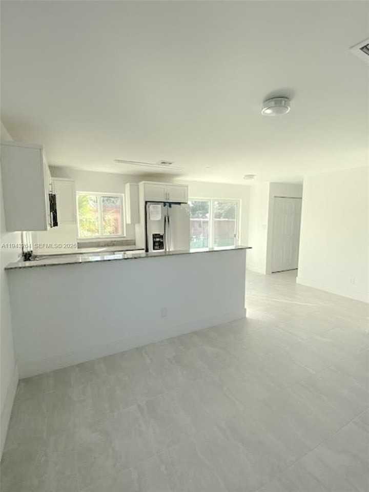 715 N 59th Ave #101 - Photo 3 of 15