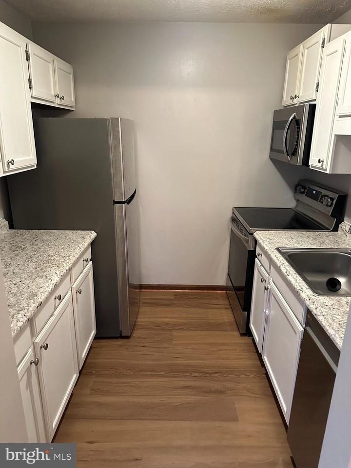 23242 Rosewood Ct Apt 1068 #1068-8F - Photo 3 of 7