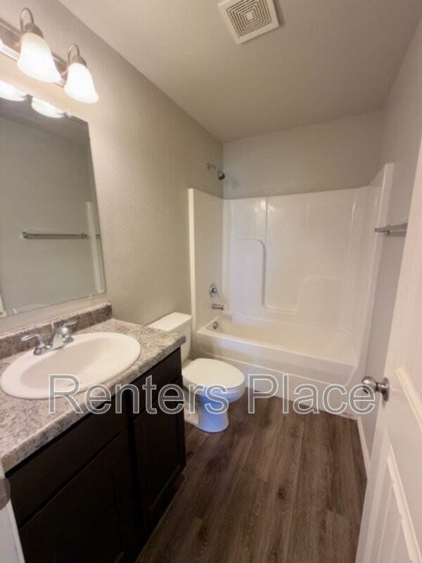 6018 E 147th St S - Photo 4 of 15