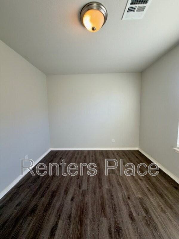 6018 E 147th St S - Photo 5 of 15