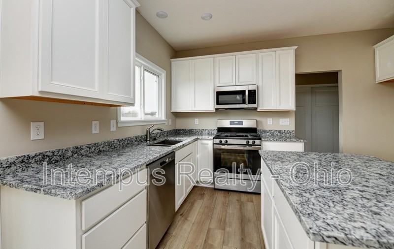 1003 Beehive Grv - Photo 5 of 34