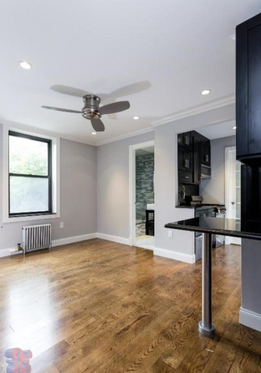 E 10th St #3 - Photo 3 of 7